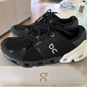 On Running Black and White Athletic Shoes